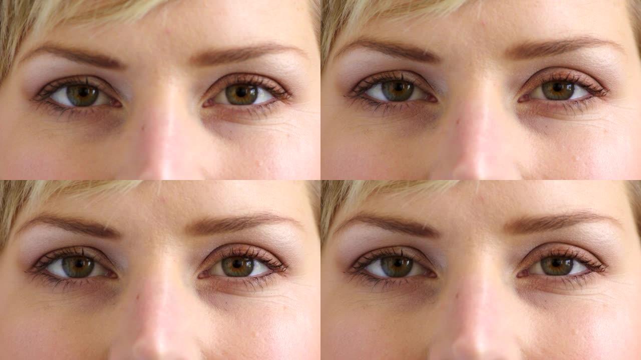 一个女人在验光师测试视力和视力的特写镜头。在验光预约期间放大女性眨眼，以检查她的眼睛并获得处方眼镜或