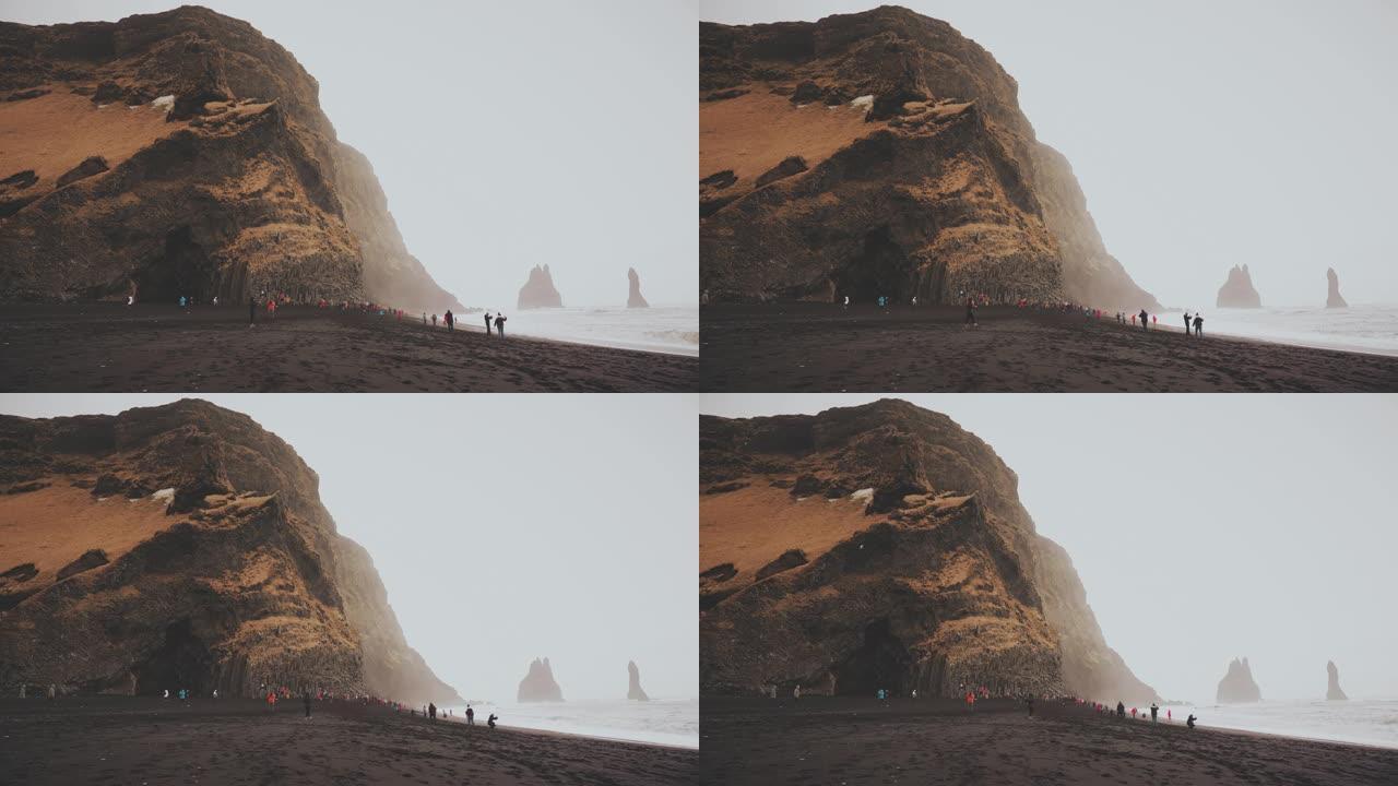 雷尼斯法拉黑沙海滩的洞穴。冰岛维克雷诺加尔山脉