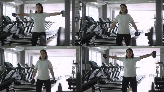 健康女性在健身房锻炼