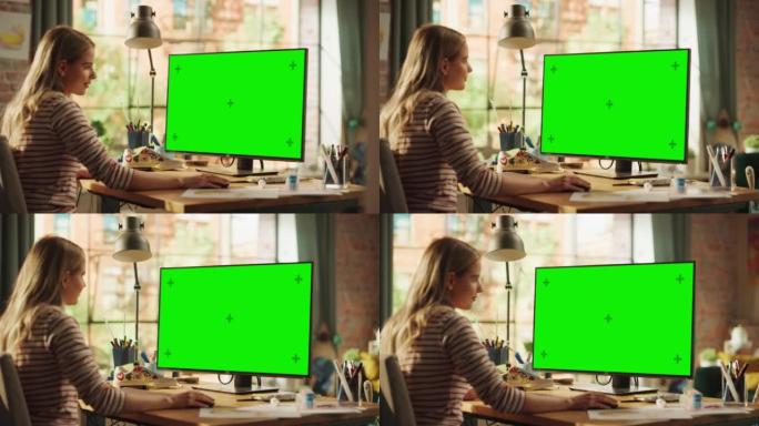 金发女创作者在带有绿色色度键屏幕的台式计算机上建模时放大和缩小。在她的项目中工作的自由女性