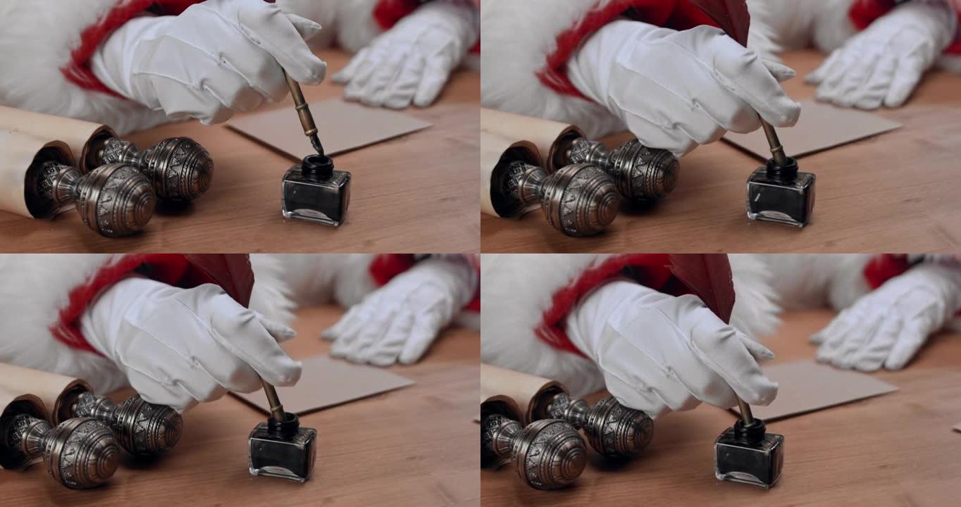 圣诞老人的手戴着白手套的特写镜头，将笔浸入墨水瓶中