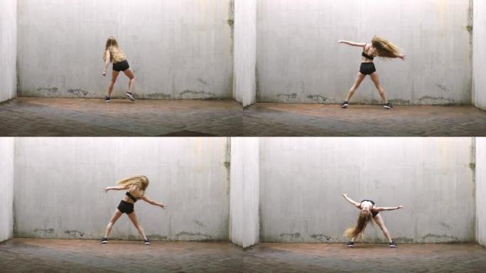 青少年，z世代舞者在垃圾空间跳舞，疯狂，自由和青春的生活方式。年轻女孩在白色墙壁模拟背景上与健身身体