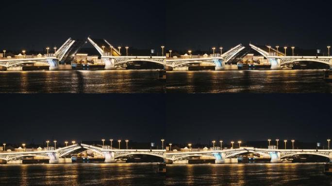 晚上在美丽的灯光下打开穿过圣彼得堡涅瓦河的桥梁