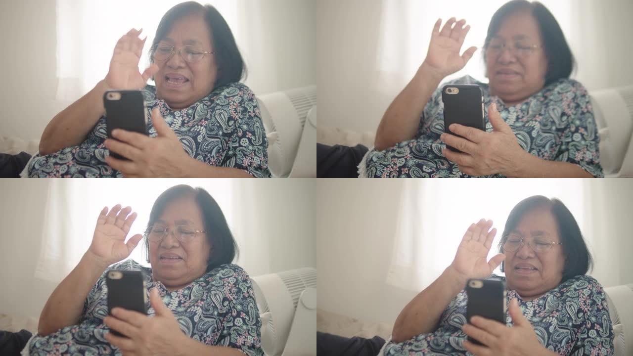 亚洲祖母和孙子有视频通话。