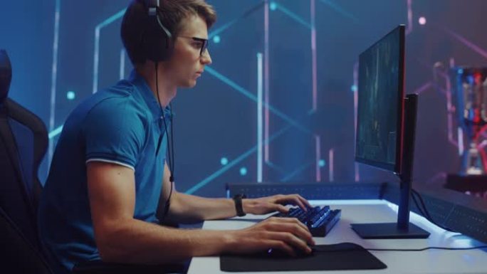 专业电子竞技游戏玩家在他的个人电脑上玩RPG MOBA模拟视频游戏，具有超级动作和有趣的特效，庆祝战
