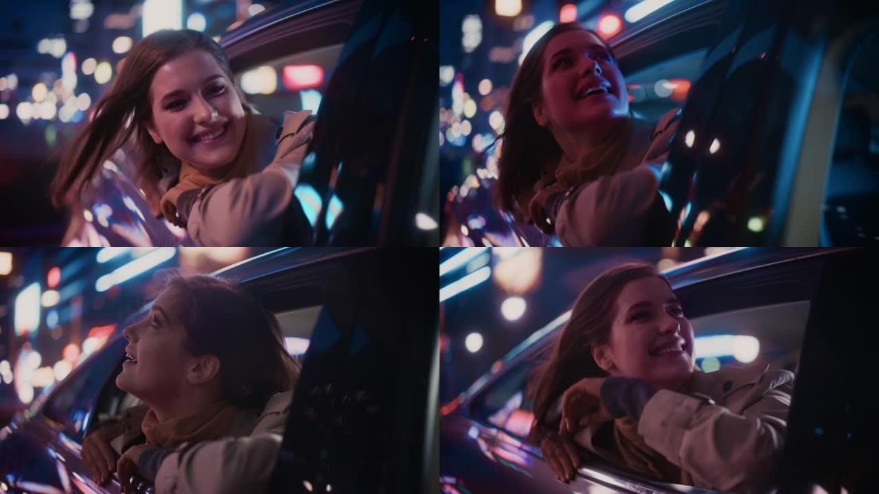 兴奋的年轻女性坐在汽车后座上，晚上通勤回家。看着窗外，惊讶地发现带有工作霓虹灯的城市街道多么美丽。电