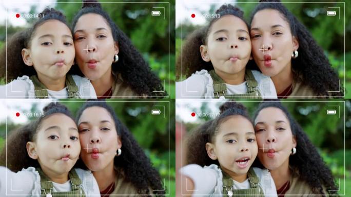 自拍照，视频和孩子在公园里的母亲在录音帧上做着愚蠢的面孔和有趣的表情。家庭视频博客，爱和妈妈与大自然