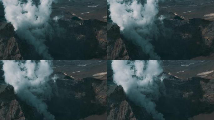 鸟儿可以看到火山的活跃火山口。火山口内火山全景景观地形。地标性自然旅游场所无人机镜头雾蒙蒙壮丽的山气