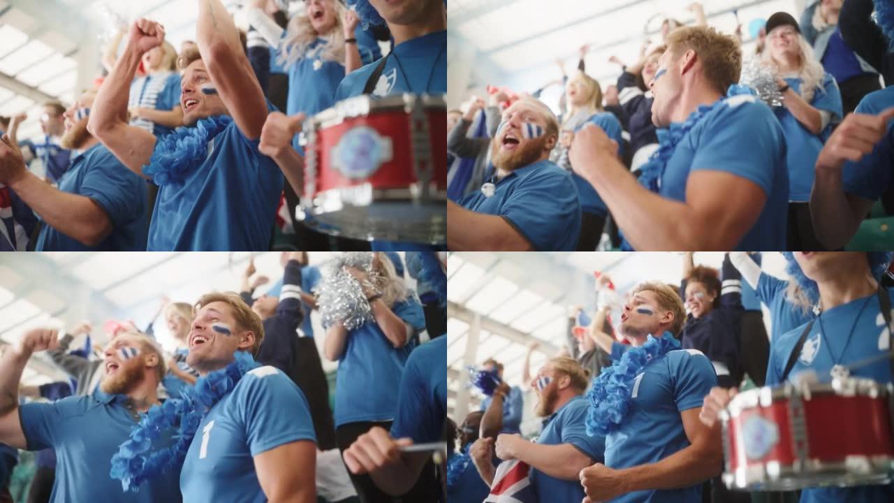 体育体育场事件: 一群球迷为他们的蓝色足球队获胜而欢呼。人们庆祝进球，冠军胜利。一群画脸的朋友欢呼，