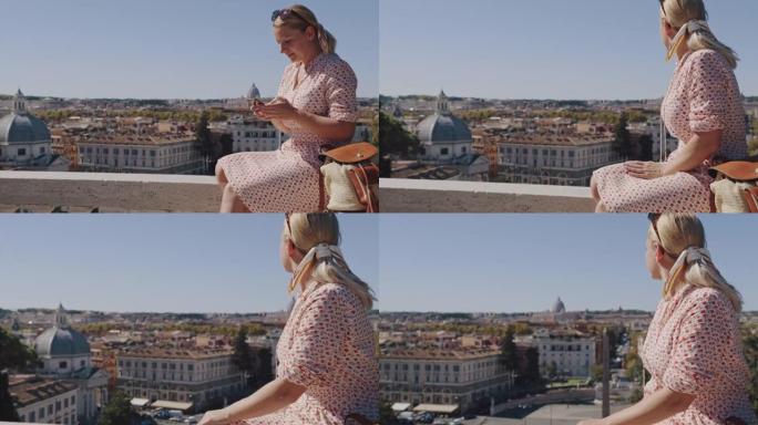 持手机的SLO MO游客可以从Terrazza Del Pincio欣赏Popolo广场的景色