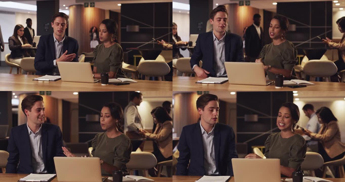 两名商人在会议休息室的笔记本电脑上进行讨论的4k视频片段