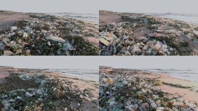 空中特写飞越躺在海滩上的塑料污染。对海洋的环境破坏。