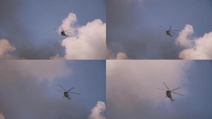 消防直升机飞越烟雾