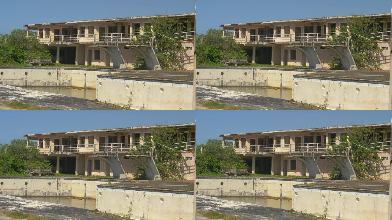 在田园诗般的加勒比海，被遗弃的酒店和游泳池在酷热中腐烂。