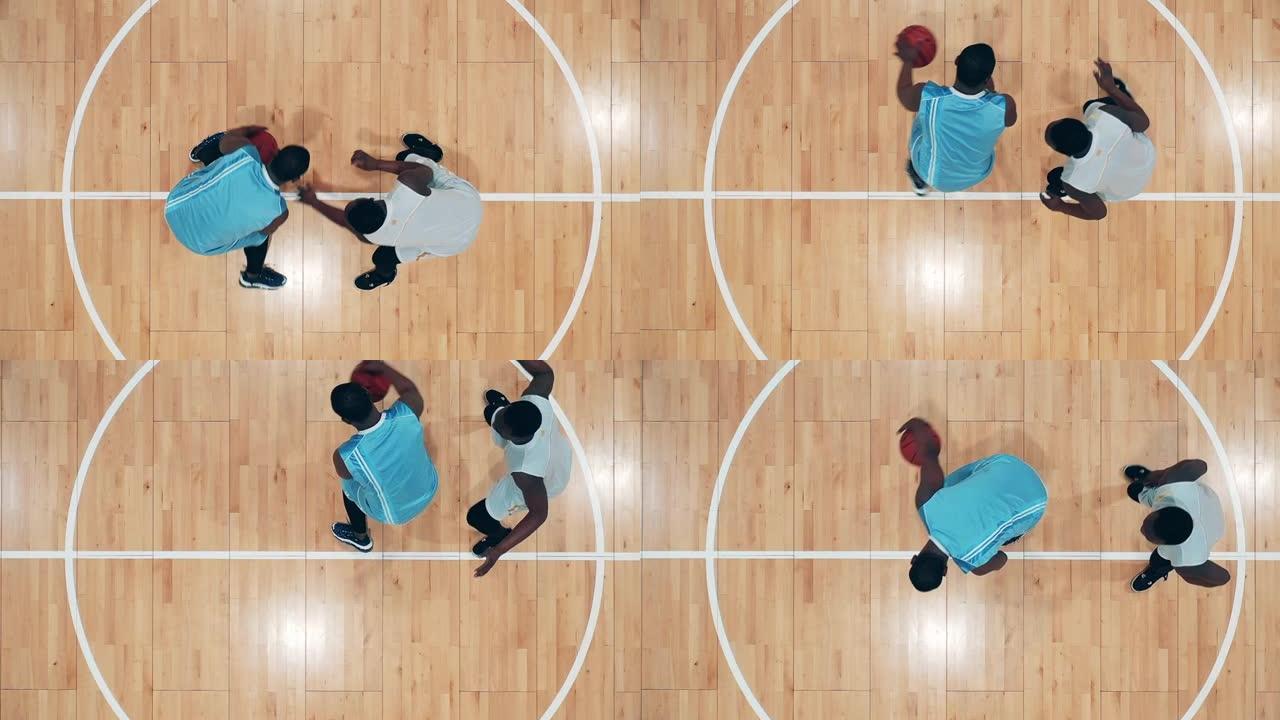 非裔美国篮球运动员在健身房练习的俯视图