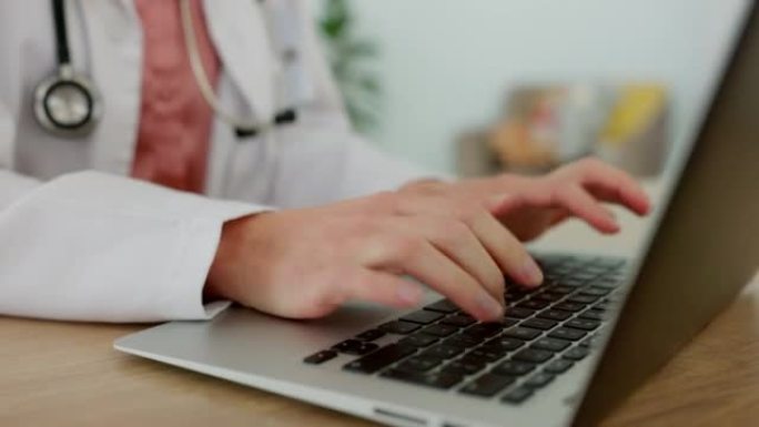 手，笔记本电脑和医疗保健，医生在医院的办公室键入电子邮件或诊断报告。在诊所在线工作的女性健康专业人员