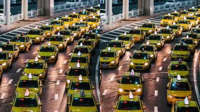 T/L ZO晚上在机场出口繁忙的黄色出租车排队
