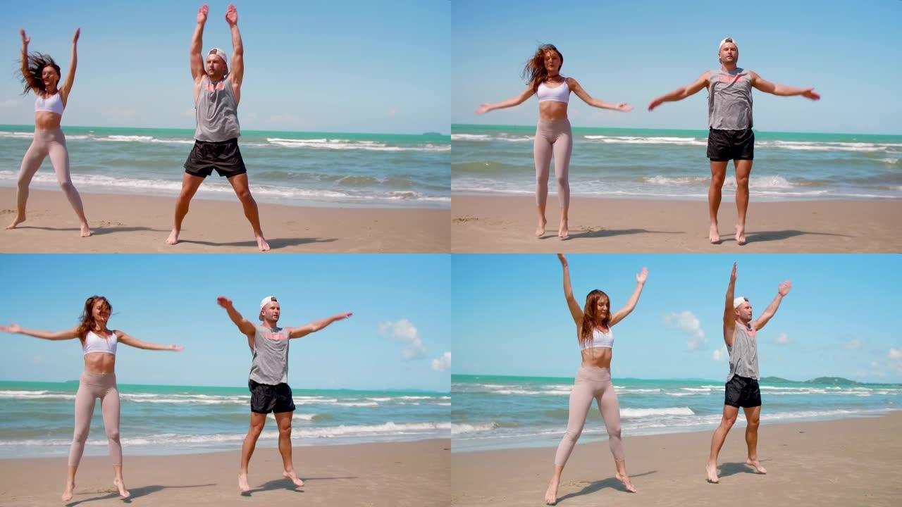 夫妇在海滩上锻炼前热身