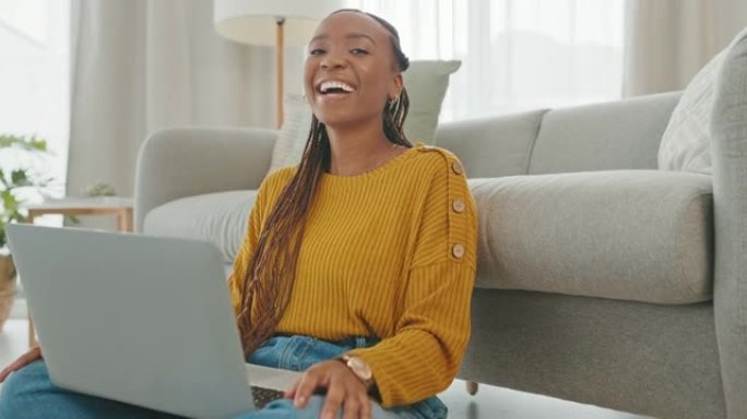 4k视频片段，一名年轻女子坐在家里使用笔记本电脑