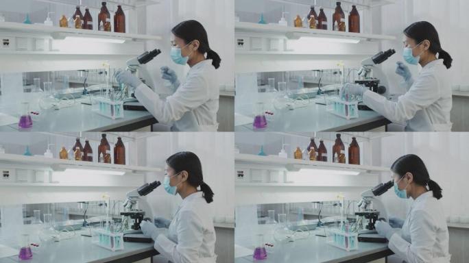 在实验室工作的亚洲女化学家