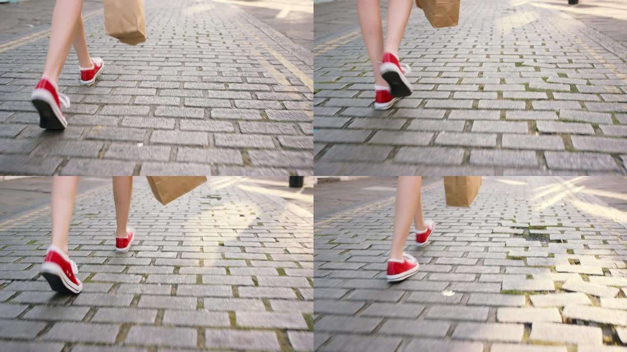 4k后视录像，一名无法辨认的妇女在城市外行走