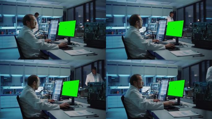 现代电子设施: 科学家，工程师在绿色色度键屏幕计算机上工作。工业PCB、硅微芯片、半导体、电信设备的