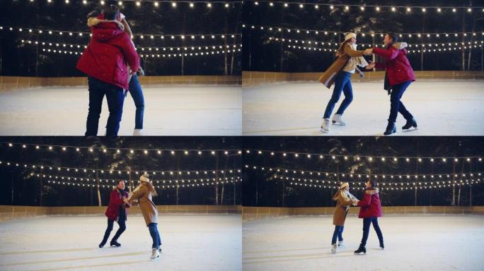 浪漫的冬天下雪的夜晚: 滑冰夫妇玩得开心，踏上溜冰场，开始跳舞，跳华尔兹。双人花样滑冰。温柔的年轻人