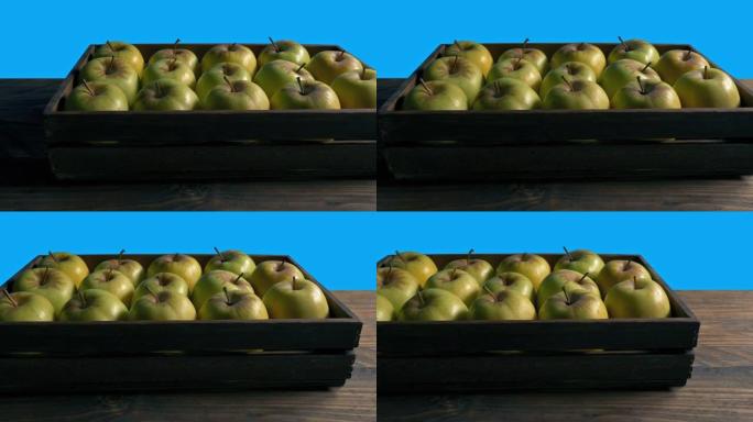 板条箱中的苹果移动镜头蓝屏隔离