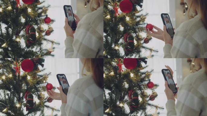 年轻女子正在拍照和录像，称她与男友的圣诞树。