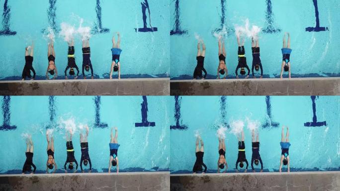 在游泳教练的指导下，在游泳池边练习腿部泼水的亚洲中国游泳运动员正上方的无人机视图