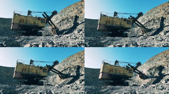 工业机器正在矿场挖掘矿石