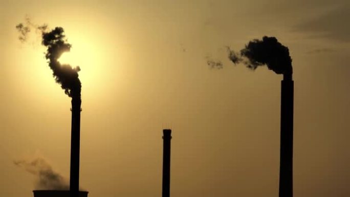 燃煤发电站烟堆剪影建筑环境污染排放气体