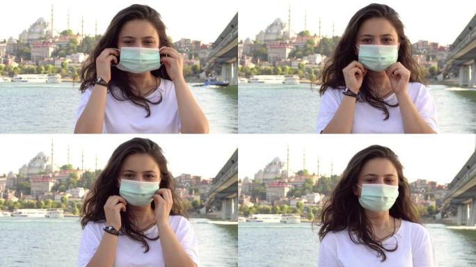 年轻的成年妇女戴着污染面具，以保护自己免受病毒侵害。4k视频