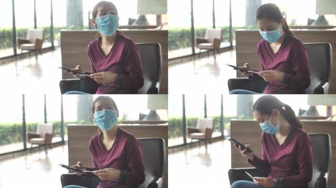 新普通亚洲女性戴口罩使用智能手机