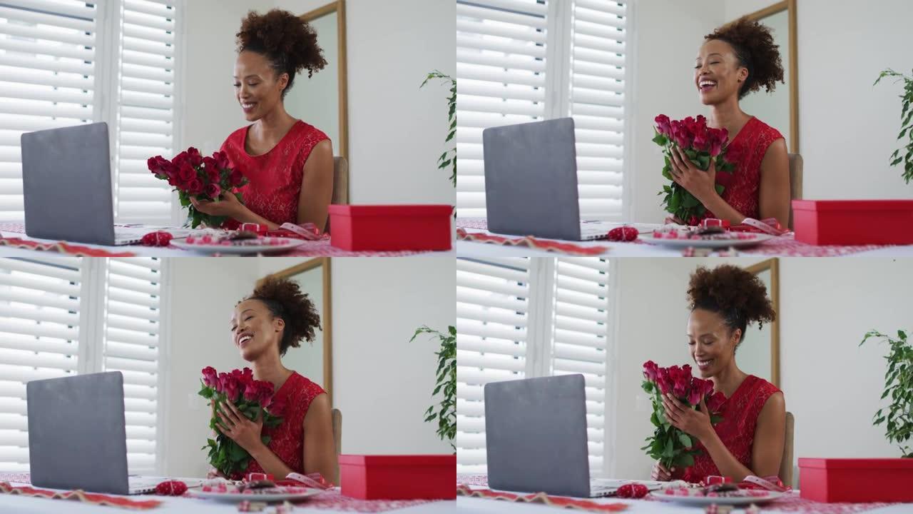 情人节约会视频通话中的快乐混血女人，手持粉红玫瑰