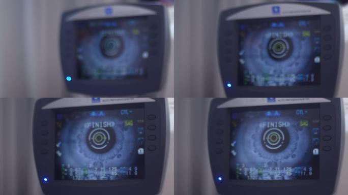 眼科医生分析测视力对焦仪器