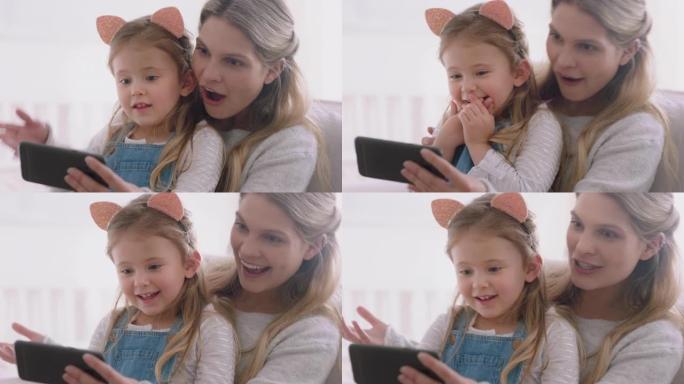 母亲和孩子使用智能手机进行视频聊天小女孩与妈妈挥舞着分享假期周末与女儿享受在手机上聊天4k镜头