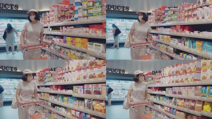 女人在超市购物，带面罩保护