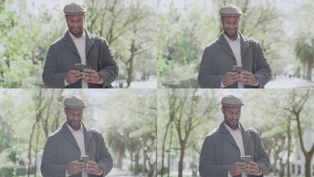 Trendy man texting on a phone, having coffee while