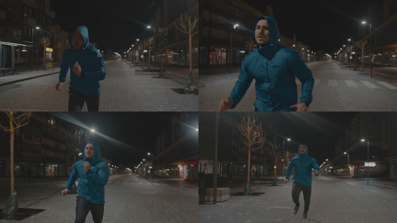 一个穿着连帽运动夹克的男人的夜间跑步