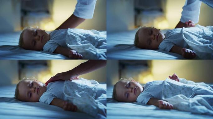 真实的电影拍摄的neo母亲在睡觉时爱抚和亲吻她的新生婴儿