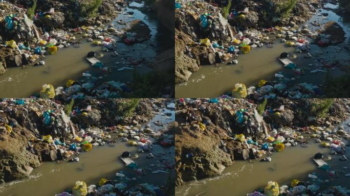 水污染。靠近非洲非正式定居点的水域中可怕的塑料污染的特写鸟瞰图