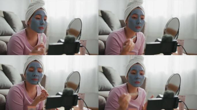 Youtuber博客作者在家中录制带有化妆化妆品的vlog视频，在社交媒体上产生在线影响者