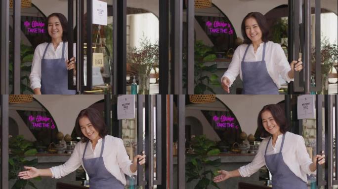 成熟的女性酒吧中小企业老板开门欢迎来到科维德之后的咖啡馆。