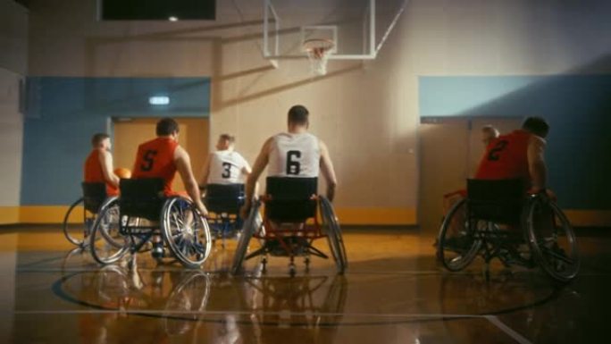 轮椅篮球比赛场地: 球员比赛，运球，成功射门，得分得分。残疾人的决心、技能。慢动作，手持后续镜头