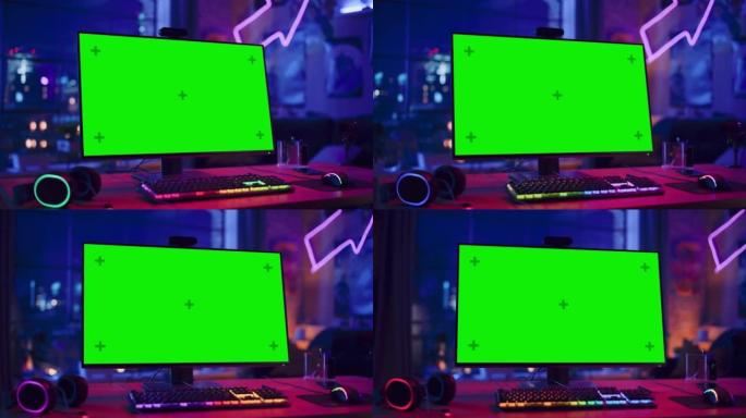 在家玩游戏: 空的游戏站，玩家的个人电脑，绿屏色度键显示站在带霓虹灯的时尚阁楼公寓的木桌上。弧射。
