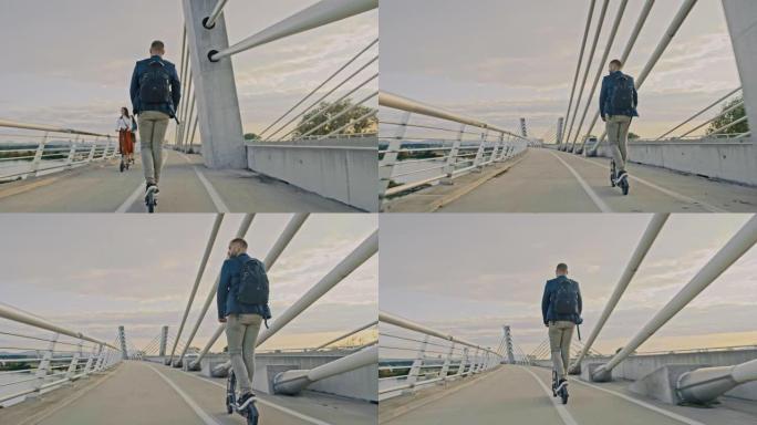 SLO MO Hipster在城市的一座桥上骑电动踏板车