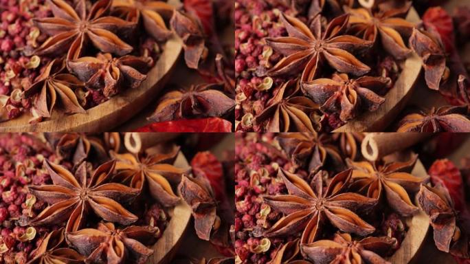 木桌上的中国香料几颗茴香星八角香料辣椒