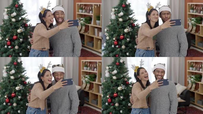 一对年轻夫妇在家一起玩乐圣诞自拍的4k视频