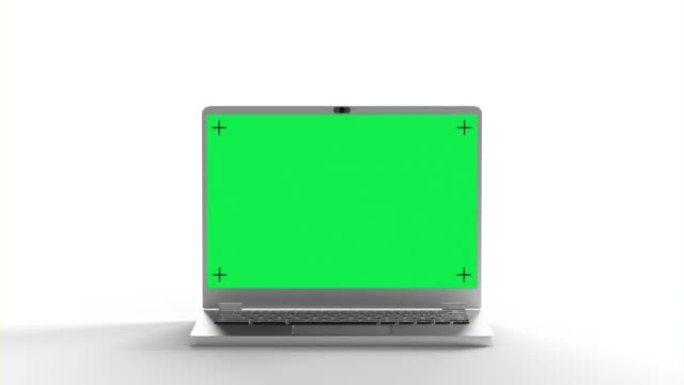 白色背景上带有色度键监视器的银色笔记本电脑